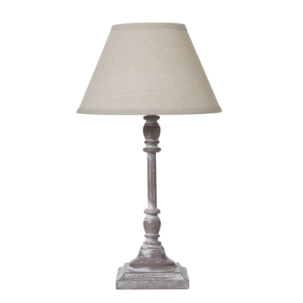 Almira Table lamp with a beige shade on a white background