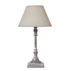 Almira Table lamp with a beige shade on a white background