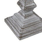 Decorative table lamp base with a textured surface on a white background