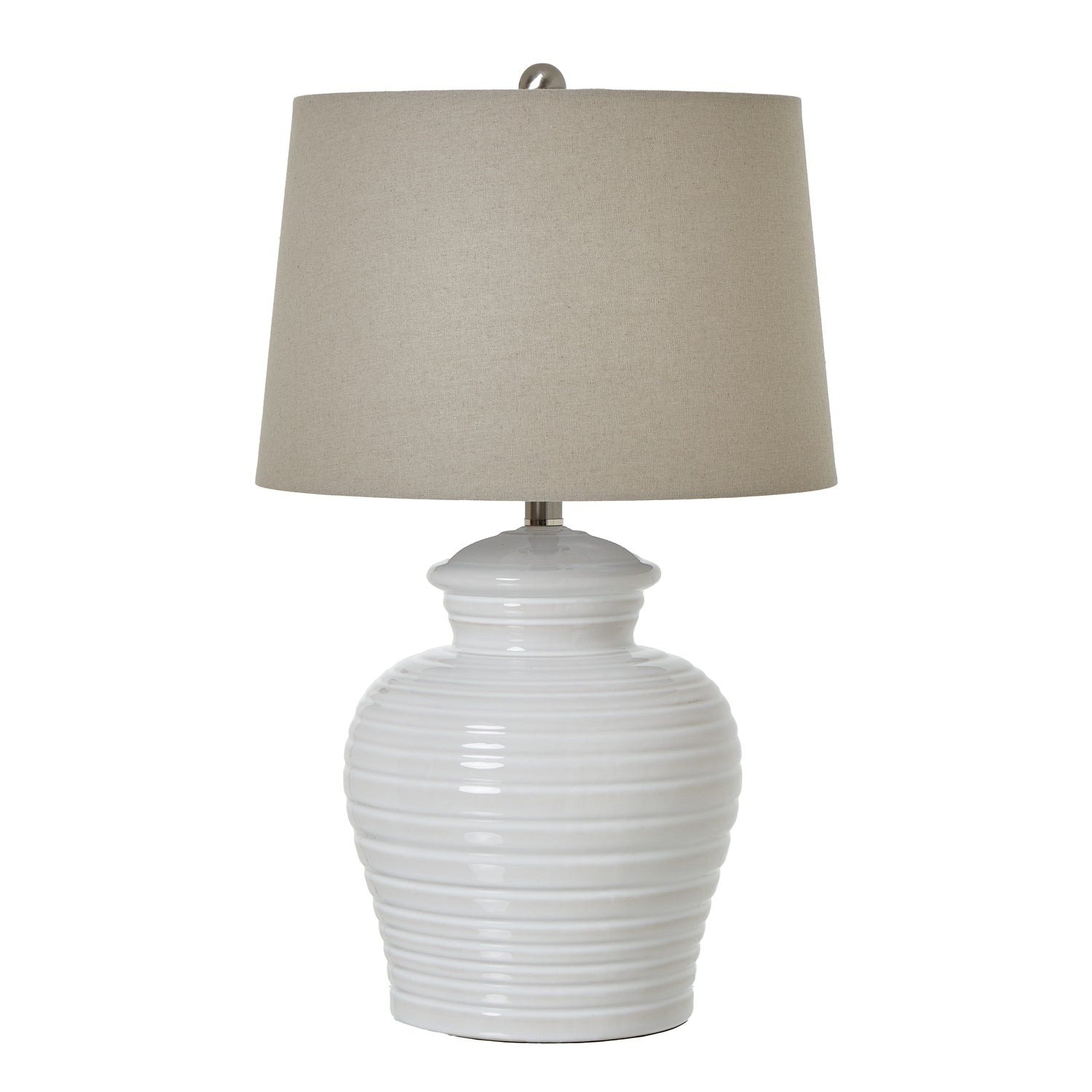White ceramic table lamp with a beige lampshade on a white background