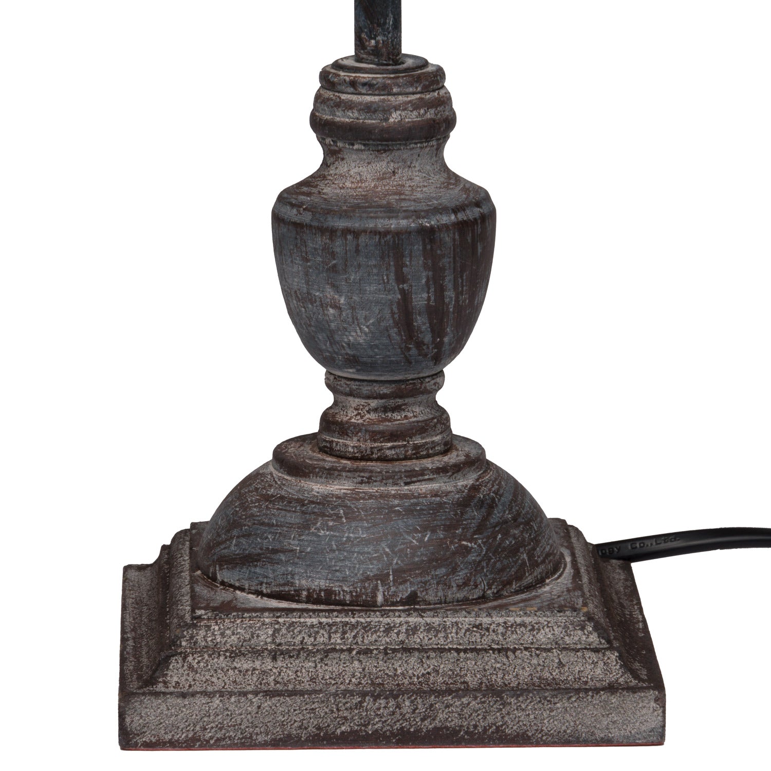 Decorative lamp base with a textured finish on a white background