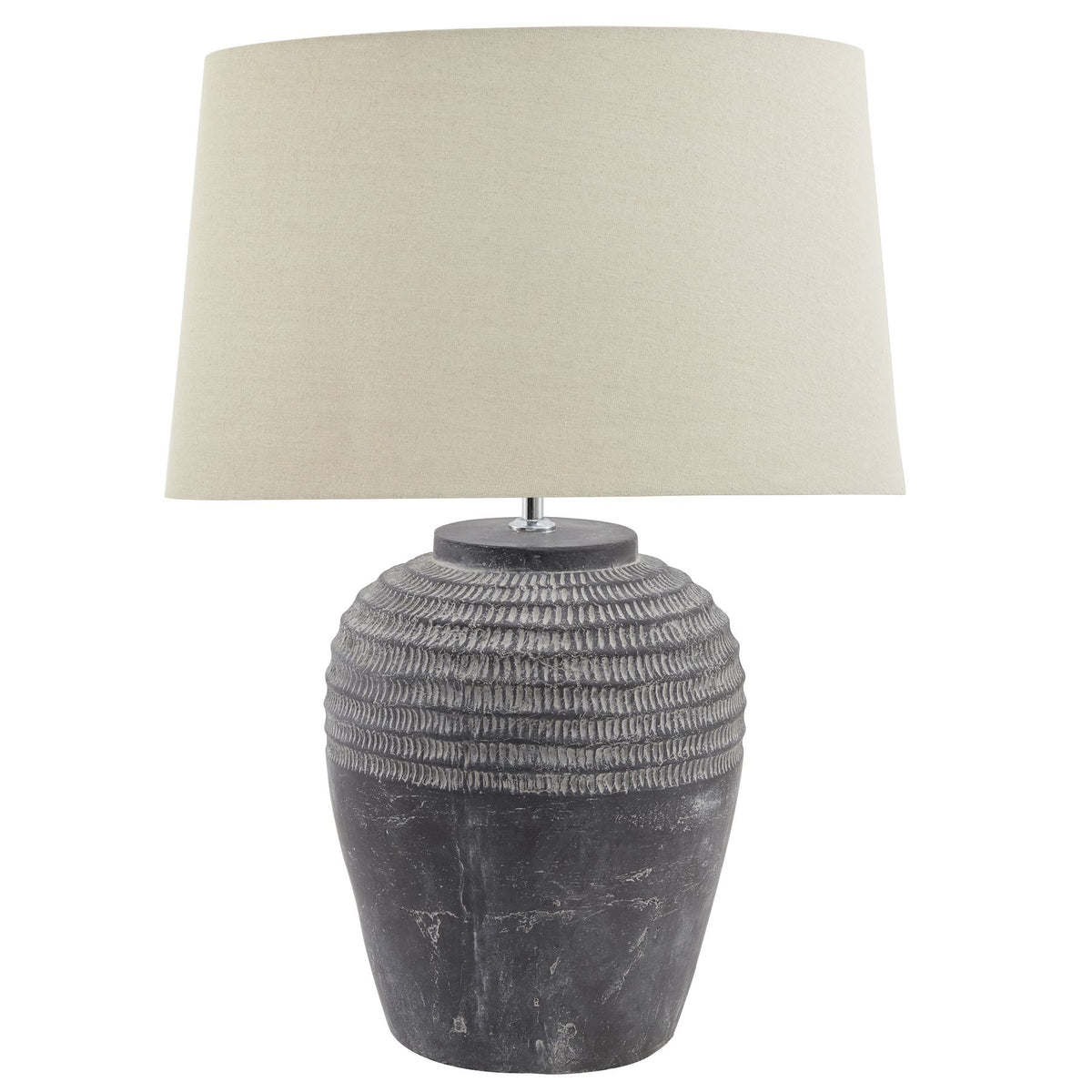 Table lamp with textured dark grey base and cream lampshade on a white background