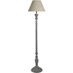 Floor lamp with a grey base and cream lampshade on a white background