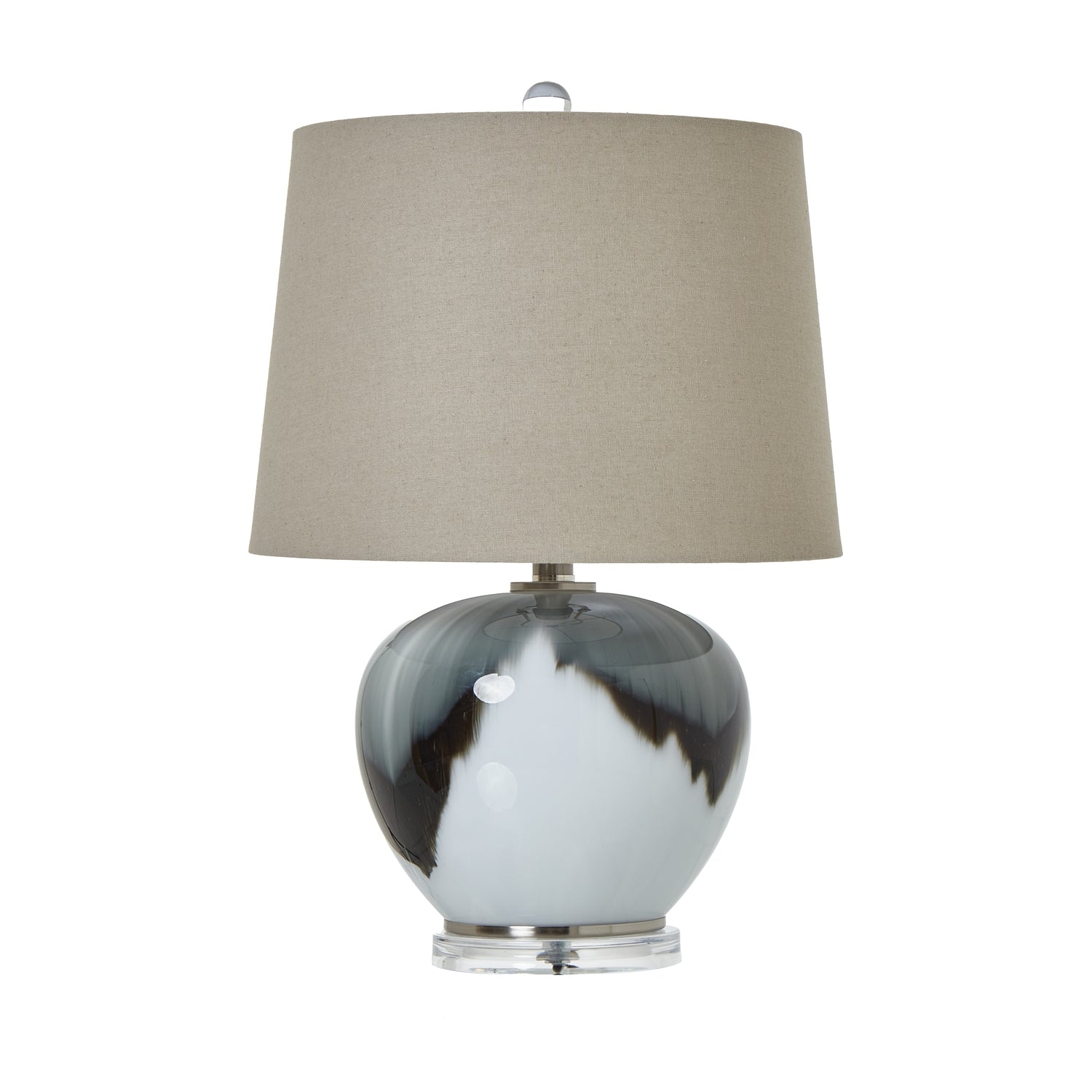 Table lamp with a marbled design base and beige lampshade on a white background