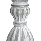 Wooden table lamp with a ribbed design on a white background