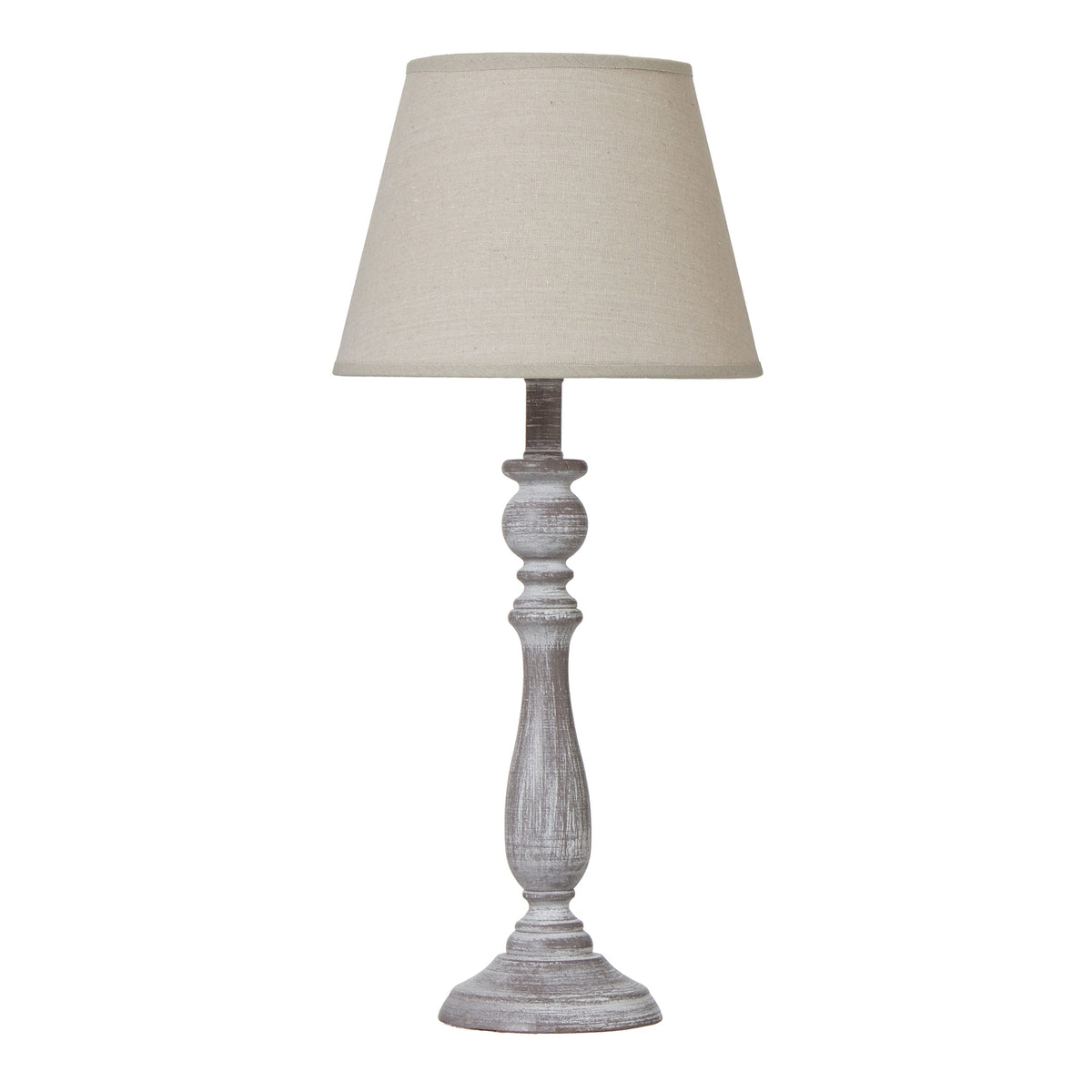 Table lamp with a cream shade and wooden base on a white background