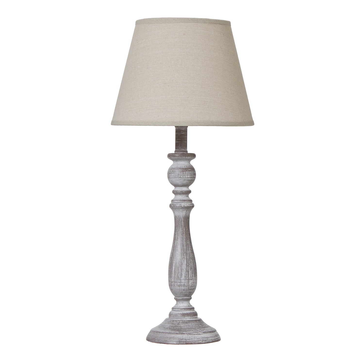 Table lamp with a cream shade and wooden base on a white background