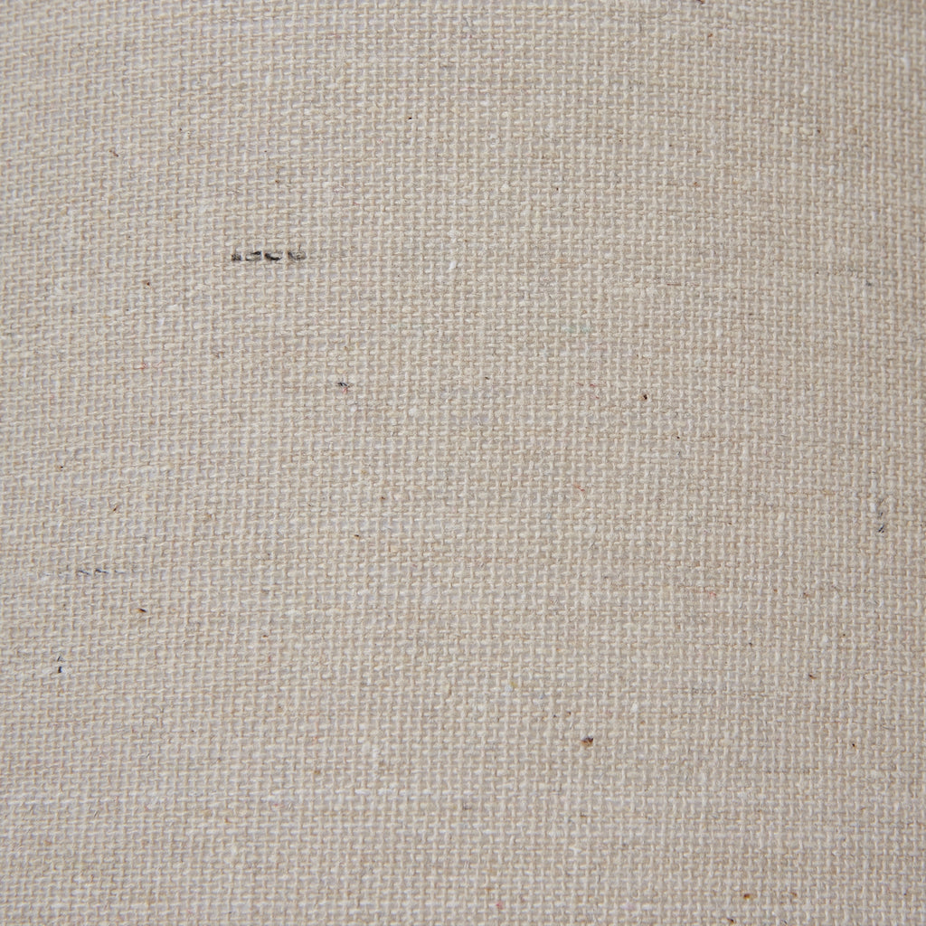 Close-up of cream lampshade fabric texture